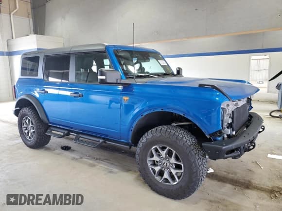 ✅ 2024 Ford Bronco Badlands • VIN: 1FMEE9BP5RLA08124 • Lot: 52100065. Listed on Copart with 6,300 mi. Free auction sales archive from the USA and detailed vehicle history report at DreamBid. Image 4.