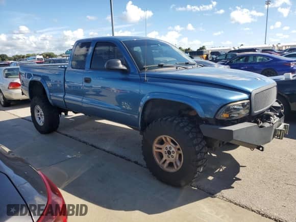 2003 Dodge Dakota с VIN 1D7HG12X93S267179, выставлен на аукционе Copart как лот 74291174 с пробегом Не указан миль и На запчасти • Non repairable. История ставок и продаж доступна на DreamBid. Изображение 4.
