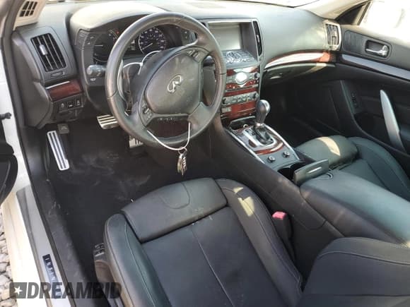 ✅ 2015 Infiniti Q60 S Limited • VIN: JN1CV6EK7FM870604 • Lot: 74284423. Listed on Copart with 81,779 mi. Free auction sales archive from the USA and detailed vehicle history report at DreamBid. Image 8.