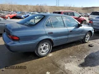 ✅ 1993 Geo Prizm • VIN: 1Y1SK5365PZ024666 • Lot: 43367225. Listed on Copart with 105,088 mi. Free auction sales archive from the USA and detailed vehicle history report at DreamBid. Image 3.