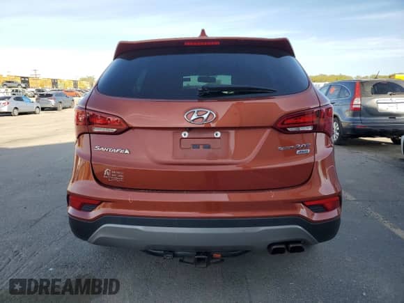 2017 Hyundai Santa Fe 2.0T z VIN 5XYZUDLA7HG490689, wystawiony jako Copart lot #53673385 z przebiegiem 131 435 mil mil oraz Szkoda całkowita • Salvage title. Historia ofert i sprzedaży dostępna na DreamBid. Obrazek 6.