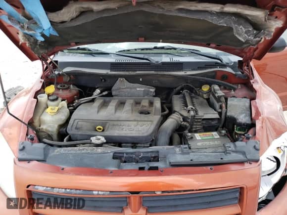 2007 Dodge Caliber с VIN 1B3HB28BX7D132931, выставлен на аукционе Copart как лот 50824734 с пробегом Не указан миль и Списание • Salvage title. История ставок и продаж доступна на DreamBid. Изображение 12.