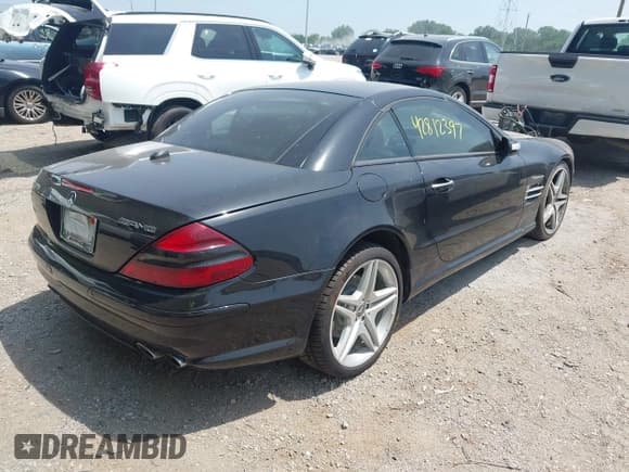 ✅ 2005 Mercedes-Benz SL 55 AMG • VIN: WDBSK74F85F101039 • Lot: 42812397. Listed on IAAI with 76,452 mi. Free auction sales archive from the USA and detailed vehicle history report at DreamBid. Image 4.