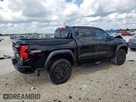 ✅ 2023 Chevrolet Colorado 4WD Trail Boss • VIN: 1GCPTEEK0P1252834 • Лот: 71637444. Опубликован ранее на Copart с пробегом 8 096 миль. Бесплатный доступ к архиву аукционных продаж из США и подробный отчёт об истории автомобиля на DreamBid. Изображение 3.