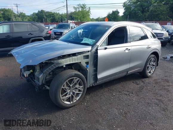 ✅ 2023 Genesis GV70 2.5T • VIN: KMUMADTB5PU098879 • Lot: 42739902. Listed on IAAI with 39,568 mi. Free auction sales archive from the USA and detailed vehicle history report at DreamBid. Image 2.