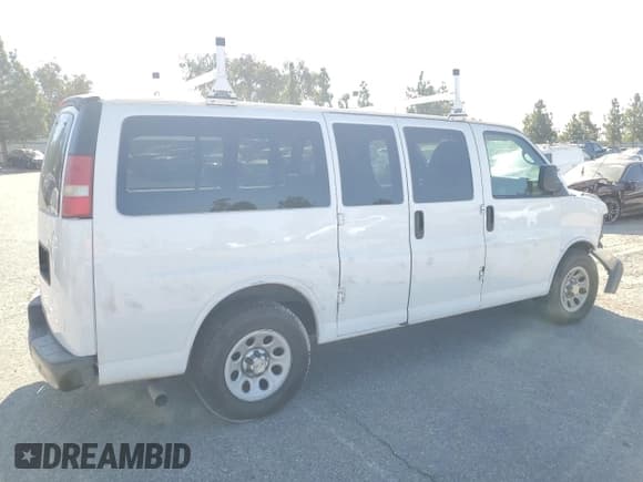 ✅ 2013 Chevrolet Express Passenger LS • VIN: 1GNSGBF4XD1186020 • Lot: 69689505. Listed on Copart with 233,505 mi. Free auction sales archive from the USA and detailed vehicle history report at DreamBid. Image 3.