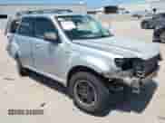 2010 Mercury Mariner z VIN 4M2CN8B75AKJ13322, wystawiony jako IAAI lot #42832064 z przebiegiem 205 074 mil mil oraz . Historia ofert i sprzedaży dostępna na DreamBid. Obrazek 1.