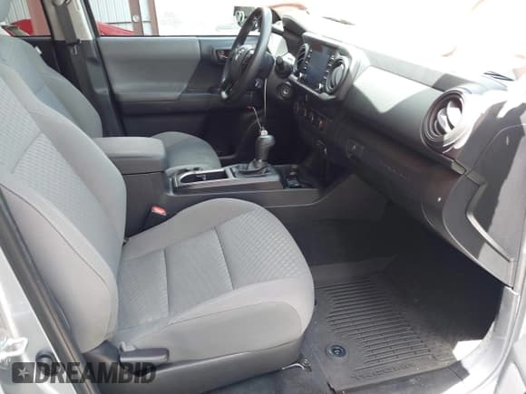 ✅ 2023 Toyota Tacoma SR • VIN: 3TMCZ5AN4PM589863 • Lot: 43068221. Wystawiony na IAAI z przebiegiem 22 288 mil. Bezpłatny archiwum sprzedaży aukcyjnych z USA i szczegółowy raport historii pojazdu na DreamBid. Zdjęcie 5.