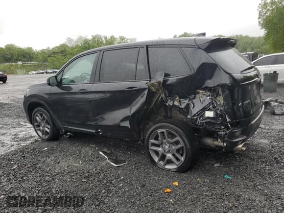 ✅ 2023 Honda Passport EX-L • VIN: 5FNYF8H55PB022183 • Lot: 57305445. Listed on Copart with 31,296 mi. Free auction sales archive from the USA and detailed vehicle history report at DreamBid. Image 2.