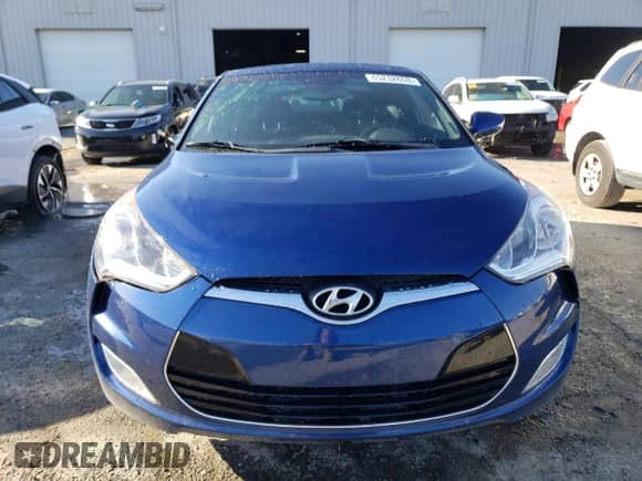 2017 Hyundai Veloster z VIN KMHTC6AD6HU320948, wystawiony jako Copart lot #45232853 z przebiegiem 34 130 mil mil oraz . Historia ofert i sprzedaży dostępna na DreamBid. Obrazek 5.