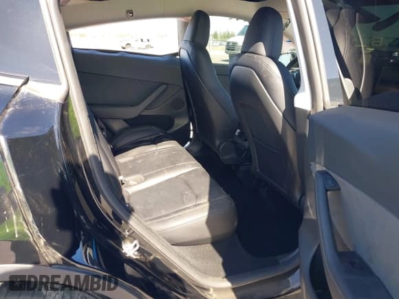 ✅ 2025 Tesla Model Y Performance • VIN: 7SAYGDEFXSF261145 • Lot: 42343916. Listed on IAAI with 7,575 mi. Free auction sales archive from the USA and detailed vehicle history report at DreamBid. Image 8.