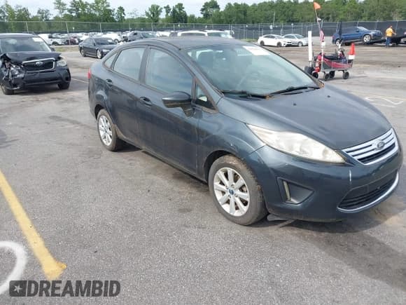✅ 2011 Ford Fiesta SE • VIN: 3FADP4BJ9BM115583 • Lot: 43026815. Listed on IAAI with 177,592 mi. Free auction sales archive from the USA and detailed vehicle history report at DreamBid. Image 1.