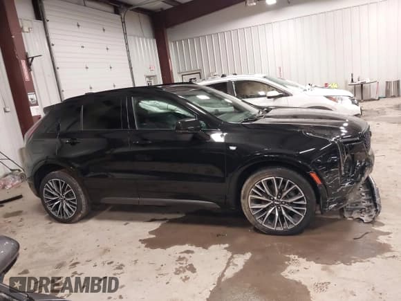 ✅ 2024 Cadillac XT4 AWD Sport • VIN: 1GYFZFR49RF109862 • Lot: 43861825. Listed on IAAI with 11,162 mi. Free auction sales archive from the USA and detailed vehicle history report at DreamBid. Image 13.