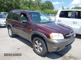 ✅ 2001 Mazda Tribute LX • VIN: 4F2YU081X1KM40012 • Lot: 42569557. Listed on IAAI with 228,754 mi. Free auction sales archive from the USA and detailed vehicle history report at DreamBid. Image 1.