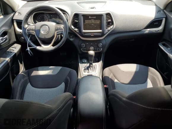 ✅ 2014 Jeep Cherokee Altitude • VIN: 1C4PJMCS5EW212252 • Lot: 64934565. Listed on Copart with 138,244 mi. Free auction sales archive from the USA and detailed vehicle history report at DreamBid. Image 8.