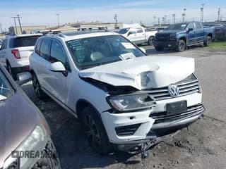 ✅ 2017 Volkswagen Touareg Wolfsburg Edition • VIN: WVGRF7BP6HD003848 • Lot: 41300149. Listed on IAAI with 183,628 mi. Free auction sales archive from the USA and detailed vehicle history report at DreamBid. Image 1.