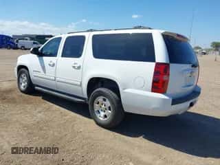 2014 Chevrolet Suburban LT z VIN 1GNSCJE0XER245963, wystawiony jako IAAI lot #43110230 z przebiegiem 160 648 mil mil oraz . Historia ofert i sprzedaży dostępna na DreamBid. Obrazek 3.
