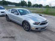 ✅ 2011 Ford Mustang V6 • VIN: 1ZVBP8AMXB5166226 • Lot: 40377235. Listed on IAAI with 111,198 mi. Free auction sales archive from the USA and detailed vehicle history report at DreamBid. Image 1.