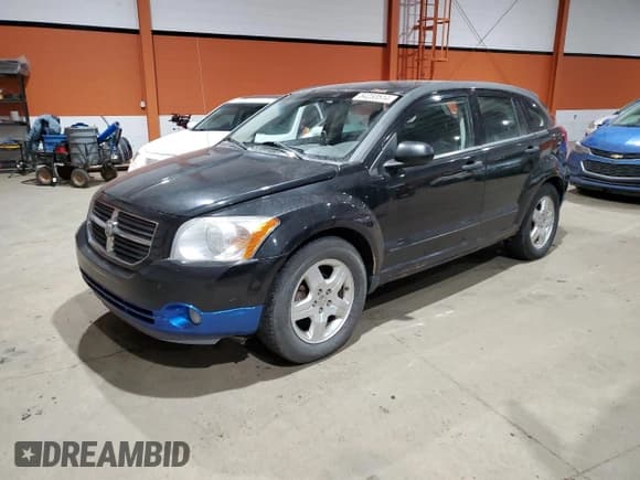 ✅ 2008 Dodge Caliber SXT • VIN: 1B3HB48B58D658865 • Лот: 84233514. Опубликован ранее на Copart с пробегом 211 769 миль. Бесплатный доступ к архиву аукционных продаж из США и подробный отчёт об истории автомобиля на DreamBid. Изображение 1.