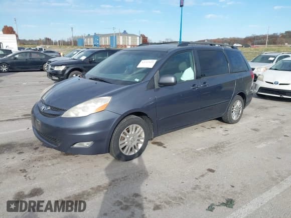 ✅ 2007 Toyota Sienna XLE • VIN: 5TDZK22C07S087863 • Lot: 43727621. Listed on IAAI with 216,506 mi. Free auction sales archive from the USA and detailed vehicle history report at DreamBid. Image 2.