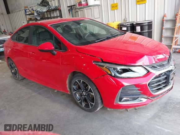 ✅ 2019 Chevrolet Cruze LT • VIN: 1G1BE5SM4K7100886 • Lot: 43227668. Listed on IAAI with 127,461 mi. Free auction sales archive from the USA and detailed vehicle history report at DreamBid. Image 1.