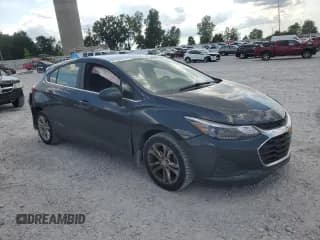 ✅ 2019 Chevrolet Cruze LT • VIN: 3G1BE6SM5KS555978 • Lot: 71033325. Listed on Copart with 103,493 mi. Free auction sales archive from the USA and detailed vehicle history report at DreamBid. Image 4.