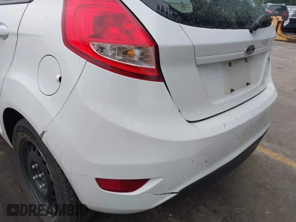 ✅ 2013 Ford Fiesta S • VIN: 3FADP4TJ1DM222984 • Lot: 42766623. Listed on IAAI with 228,073 mi. Free auction sales archive from the USA and detailed vehicle history report at DreamBid. Image 16.