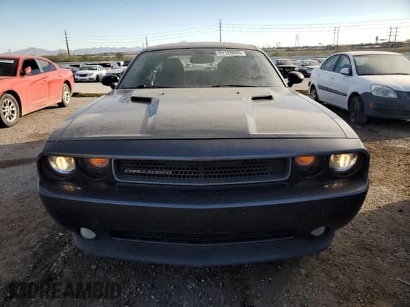 2013 Dodge Challenger SXT с VIN 2C3CDYAG2DH676337, выставлен на аукционе Copart как лот 91129205 с пробегом 173 059 миль миль и Списание • Salvage title. История ставок и продаж доступна на DreamBid. Изображение 5.