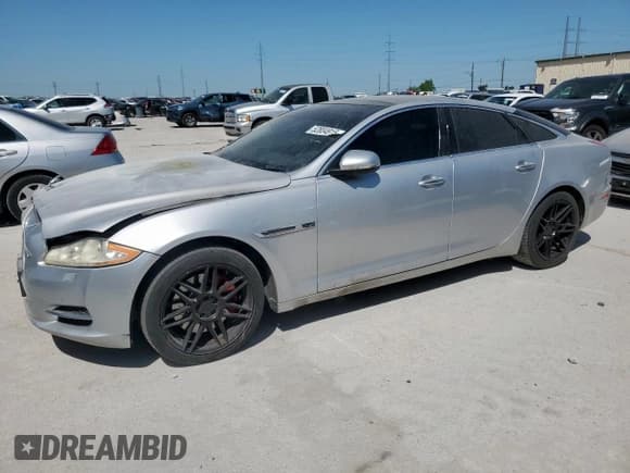 ✅ 2012 Jaguar XJ • VIN: SAJWA1CB0CLV23002 • Lot: 52804915. Wystawiony na Copart z przebiegiem 149 331 mil. Bezpłatny archiwum sprzedaży aukcyjnych z USA i szczegółowy raport historii pojazdu na DreamBid. Zdjęcie 1.