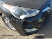 ✅ 2013 Hyundai Veloster w/Gray Int • VIN: KMHTC6AD1DU141372 • Lot: 41349170. Wystawiony na IAAI z przebiegiem Nie podano. Bezpłatny archiwum sprzedaży aukcyjnych z USA i szczegółowy raport historii pojazdu na DreamBid. Zdjęcie 6.