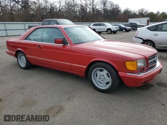 ✅ 1987 Mercedes-Benz 560 560SEC • VIN: WDBCA45D6HA348824 • Лот: 49355285. Опубликован ранее на Copart с пробегом 281 540 миль. Бесплатный доступ к архиву аукционных продаж из США и подробный отчёт об истории автомобиля на DreamBid. Изображение 4.