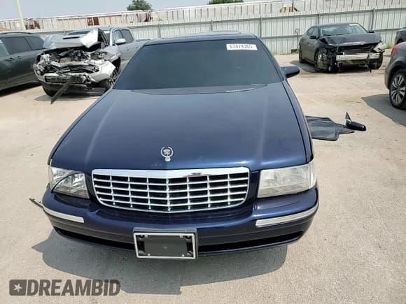 ✅ 1997 Cadillac DeVille • VIN: 1G6KD54Y2VU264494 • Lot: 67474365. Listed on Copart with 142,504 mi. Free auction sales archive from the USA and detailed vehicle history report at DreamBid. Image 13.