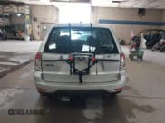 ✅ 2009 Subaru Forester X • VIN: JF2SH61649H772721 • Lot: 42572897. Listed on IAAI with 153,255 mi. Free auction sales archive from the USA and detailed vehicle history report at DreamBid. Image 15.