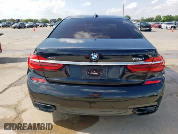 ✅ 2018 BMW 7 Series 740i xDrive • VIN: WBA7E4C55JGV28167 • Лот: 58153905. Опубликован ранее на Copart с пробегом Не указан. Бесплатный доступ к архиву аукционных продаж из США и подробный отчёт об истории автомобиля на DreamBid. Изображение 6.