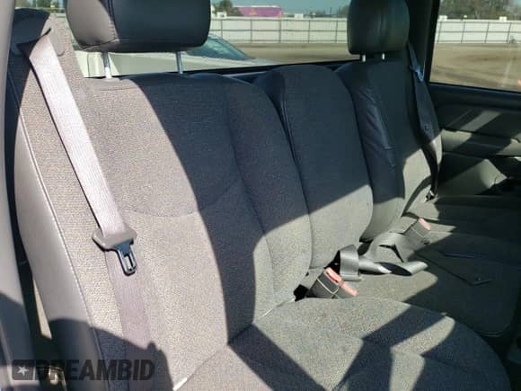 2004 Chevrolet Silverado 1500 LS z VIN 1GCEC14VX4Z171221, wystawiony jako Copart lot #78542024 z przebiegiem 254 153 mil mil oraz Szkoda całkowita • Salvage title. Historia ofert i sprzedaży dostępna na DreamBid. Obrazek 10.