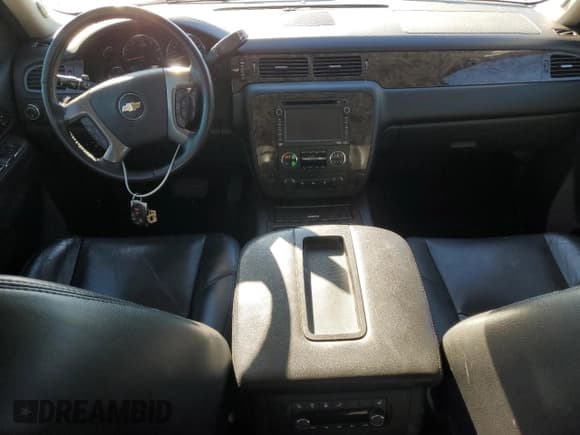 ✅ 2014 Chevrolet Tahoe LTZ • VIN: 1GNSCCE03ER216526 • Lot: 87282565. Listed on Copart with 154,021 mi. Free auction sales archive from the USA and detailed vehicle history report at DreamBid. Image 8.