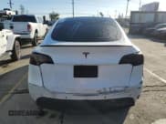 ✅ 2021 Tesla Model Y Standard Range • VIN: 5YJYGDED2MF103025 • Lot: 92748215. Listed on Copart with 54,115 mi. Free auction sales archive from the USA and detailed vehicle history report at DreamBid. Image 6.
