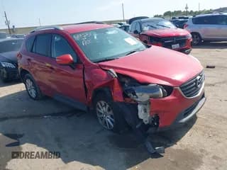 ✅ 2016 Mazda CX-5 Touring • VIN: JM3KE2CY3G0603307 • Lot: 43509734. Wystawiony na IAAI z przebiegiem 227 781 mil. Bezpłatny archiwum sprzedaży aukcyjnych z USA i szczegółowy raport historii pojazdu na DreamBid. Zdjęcie 1.