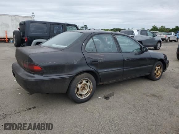 ✅ 1996 Geo Prizm • VIN: 1Y1SK5262TZ007299 • Lot: 62379425. Listed on Copart with 128,742 mi. Free auction sales archive from the USA and detailed vehicle history report at DreamBid. Image 3.