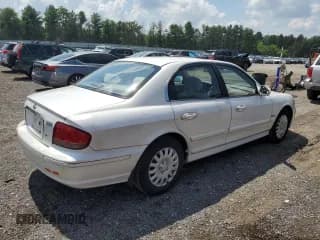 ✅ 2002 Hyundai Sonata • VIN: KMHWF25SX2A653457 • Lot: 64382015. Listed on Copart with 127,947 mi. Free auction sales archive from the USA and detailed vehicle history report at DreamBid. Image 3.