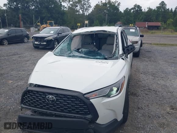 ✅ 2023 Toyota Corolla Cross L • VIN: 7MUAAAAG3PV043747 • Лот: 43424034. Опубликован ранее на IAAI с пробегом 49 791 миль. Бесплатный доступ к архиву аукционных продаж из США и подробный отчёт об истории автомобиля на DreamBid. Изображение 6.