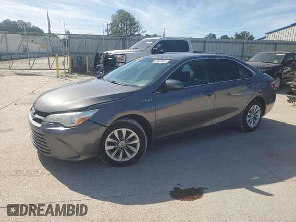 ✅ 2017 Toyota Camry Hybrid LE • VIN: 4T1BD1FK6HU202370 • Лот: 89898395. Опубликован ранее на Copart с пробегом 186 736 миль. Бесплатный доступ к архиву аукционных продаж из США и подробный отчёт об истории автомобиля на DreamBid. Изображение 1.