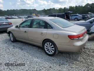 2007 Hyundai Azera SE z VIN KMHFC46F67A208968, wystawiony jako Copart lot #69202034 z przebiegiem 156 521 mil mil oraz Szkoda całkowita • Salvage title. Historia ofert i sprzedaży dostępna na DreamBid. Obrazek 2.