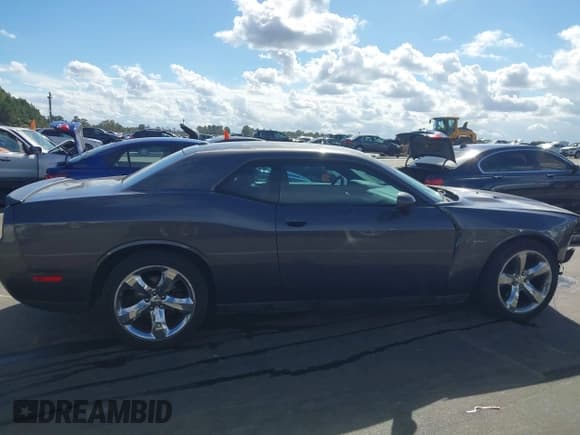 ✅ 2013 Dodge Challenger SXT • VIN: 2C3CDYAG0DH684162 • Lot: 43399757. Listed on IAAI with 113,941 mi. Free auction sales archive from the USA and detailed vehicle history report at DreamBid. Image 13.