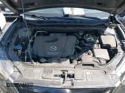 ✅ 2015 Mazda CX-5 Grand Touring • VIN: JM3KE2DY0F0510869 • Lot: 42510575. Wystawiony na IAAI z przebiegiem 134 527 mil. Bezpłatny archiwum sprzedaży aukcyjnych z USA i szczegółowy raport historii pojazdu na DreamBid. Zdjęcie 10.