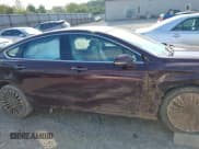 ✅ 2017 Ford Fusion Titanium • VIN: 3FA6P0D90HR231500 • Lot: 42220802. Listed on IAAI with 104,041 mi. Free auction sales archive from the USA and detailed vehicle history report at DreamBid. Image 13.