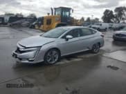 ✅ 2018 Honda Clarity Touring • VIN: JHMZC5F3XJC015360 • Lot: 91234415. Wystawiony na Copart z przebiegiem 48 452 mil. Bezpłatny archiwum sprzedaży aukcyjnych z USA i szczegółowy raport historii pojazdu na DreamBid. Zdjęcie 1.
