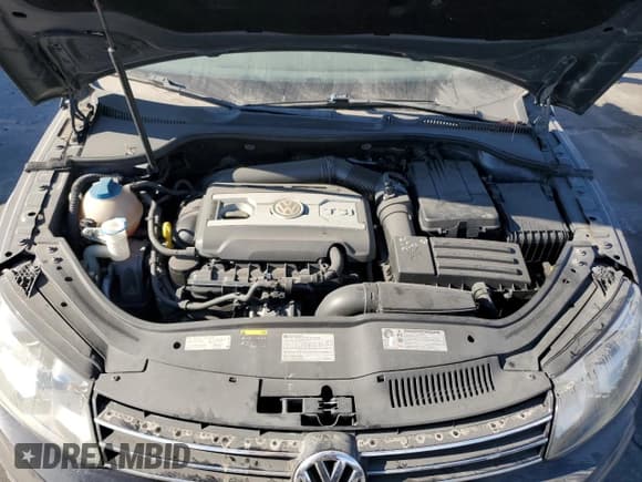 ✅ 2014 Volkswagen Eos Executive • VIN: WVWFW8AH8EV005551 • Lot: 70575365. Wystawiony na Copart z przebiegiem 93 816 mil. Bezpłatny archiwum sprzedaży aukcyjnych z USA i szczegółowy raport historii pojazdu na DreamBid. Zdjęcie 11.