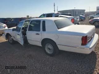 ✅ 1997 Lincoln Town Car Executive • VIN: 1LNLM81W4VY679407 • Lot: 75361054. Listed on Copart with Not provided. Free auction sales archive from the USA and detailed vehicle history report at DreamBid. Image 2.