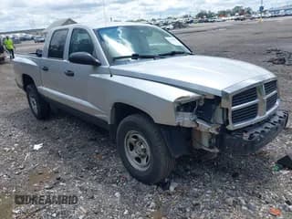 ✅ 2006 Dodge Dakota ST • VIN: 1D7HW28K36S626910 • Lot: 42193257. Wystawiony na IAAI z przebiegiem 158 933 mil. Bezpłatny archiwum sprzedaży aukcyjnych z USA i szczegółowy raport historii pojazdu na DreamBid. Zdjęcie 1.